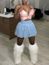 Minifaldas plisadas de cintura alta de mezclilla